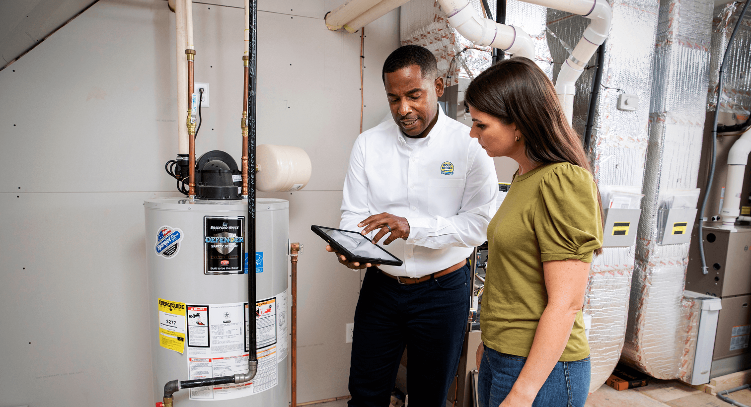 Homeowner and technician looking at a tablet