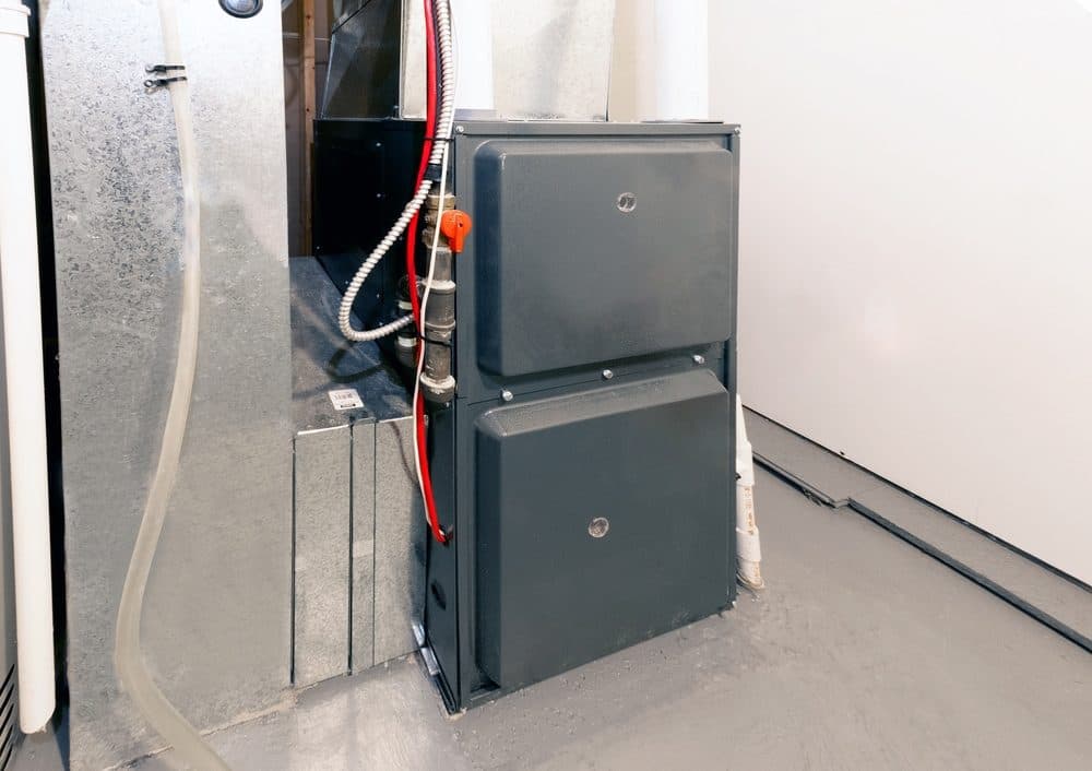 A utility closet with an HVAC system