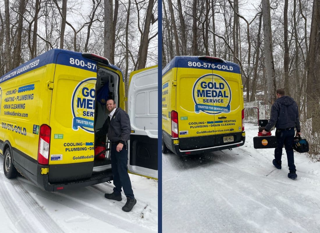 A Gold Medal technician walking on a driveway after a snow fall