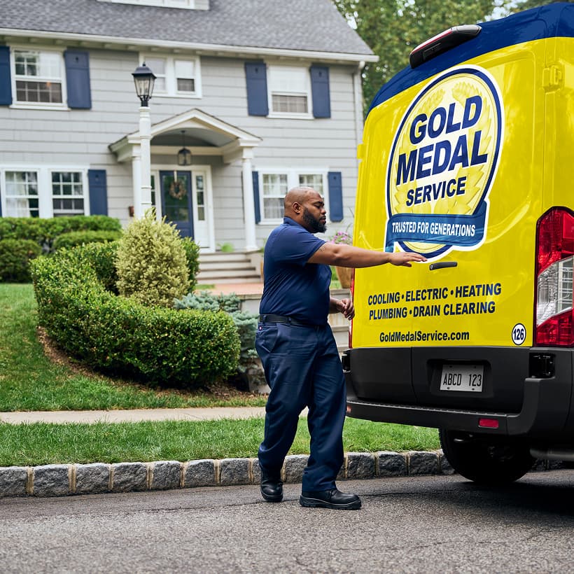 A Gold Medal technician arrives at a home ready to provide expert HVAC, plumbing, and electrical services.