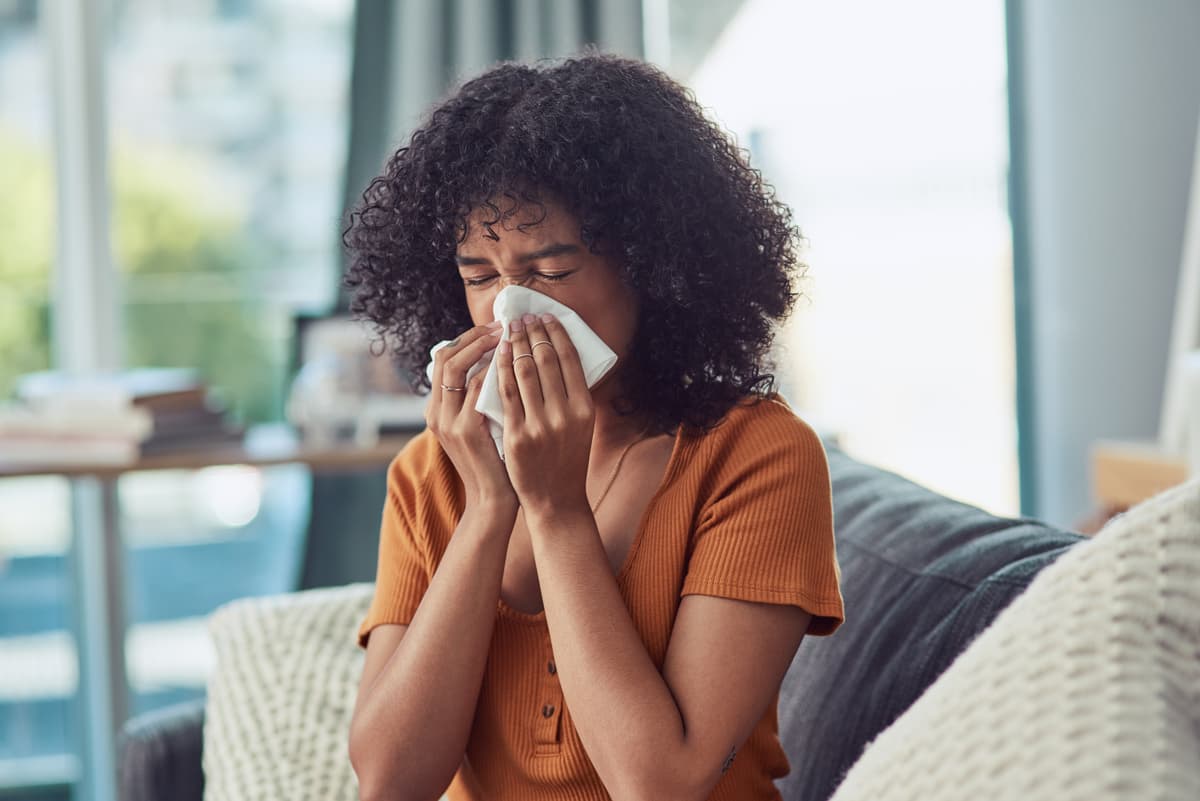 Woman Sneezing Tissue