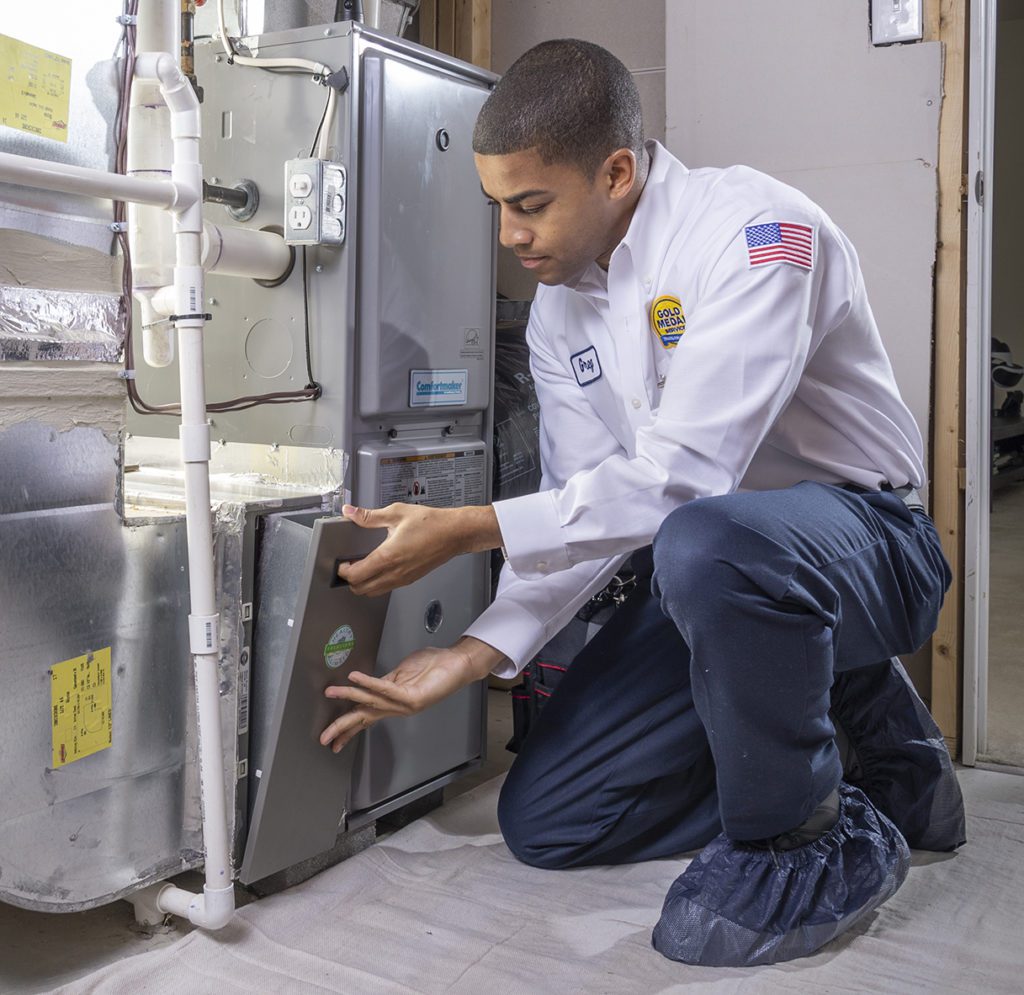 Gold Medal Tech working with Heater